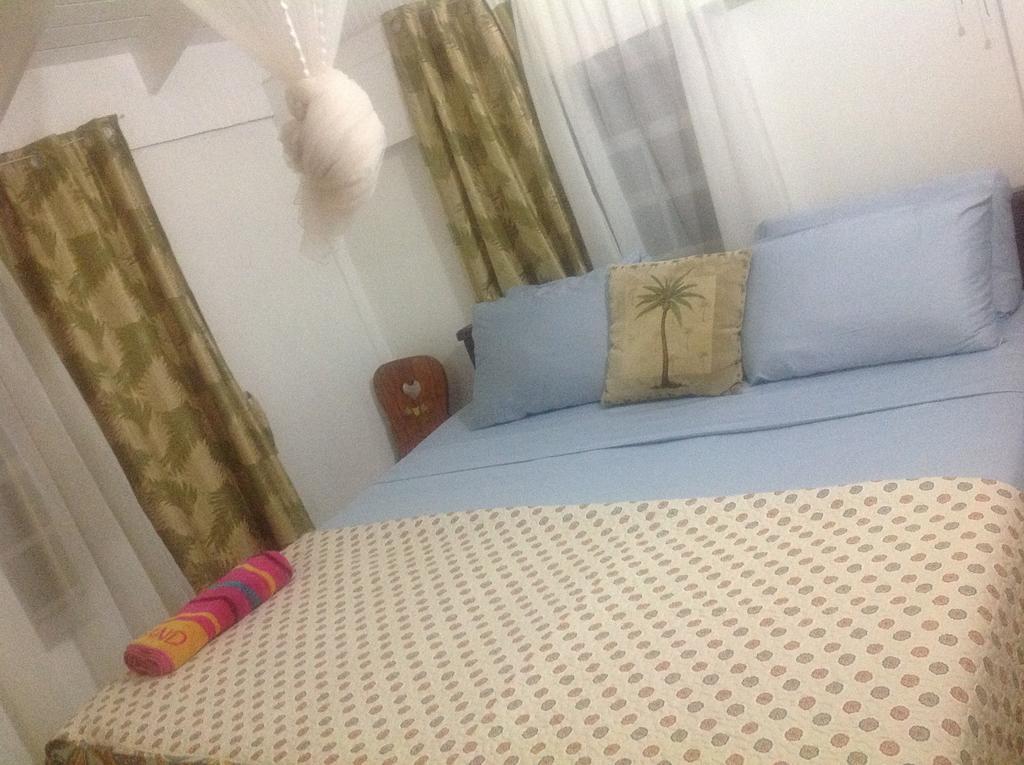 Rainbow Beach Apartments & Rooms Calibishie Bilik gambar